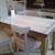 Ralph Lauren Home dining table with sliding leaves